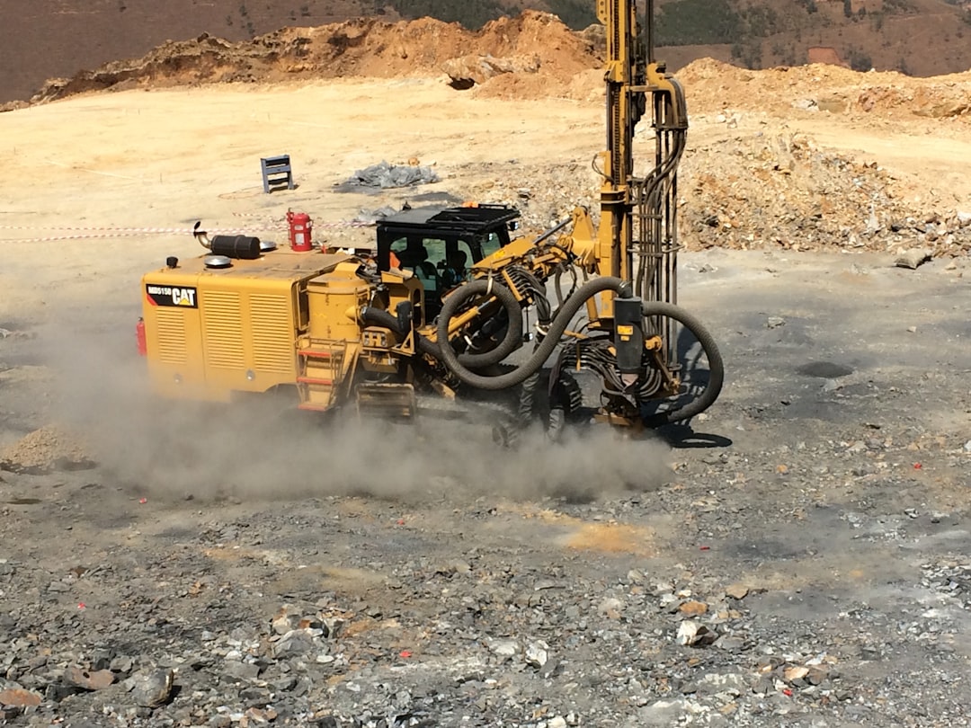 Large drilling rig operating on a rugged construction site